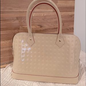Gently used! Arcadia Handbag Cappuccino Patent Leather.
